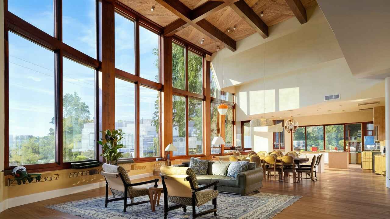 large windows that allow plenty of natural light to flood the interior spaces.