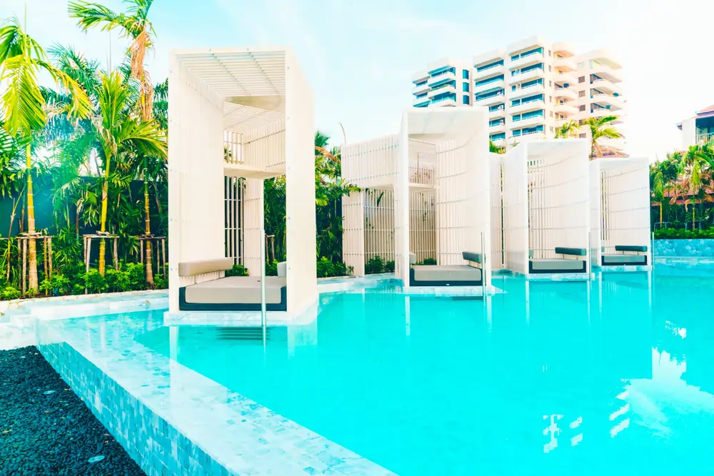 Exterior design features like the landscape, pool, and outdoor living spaces