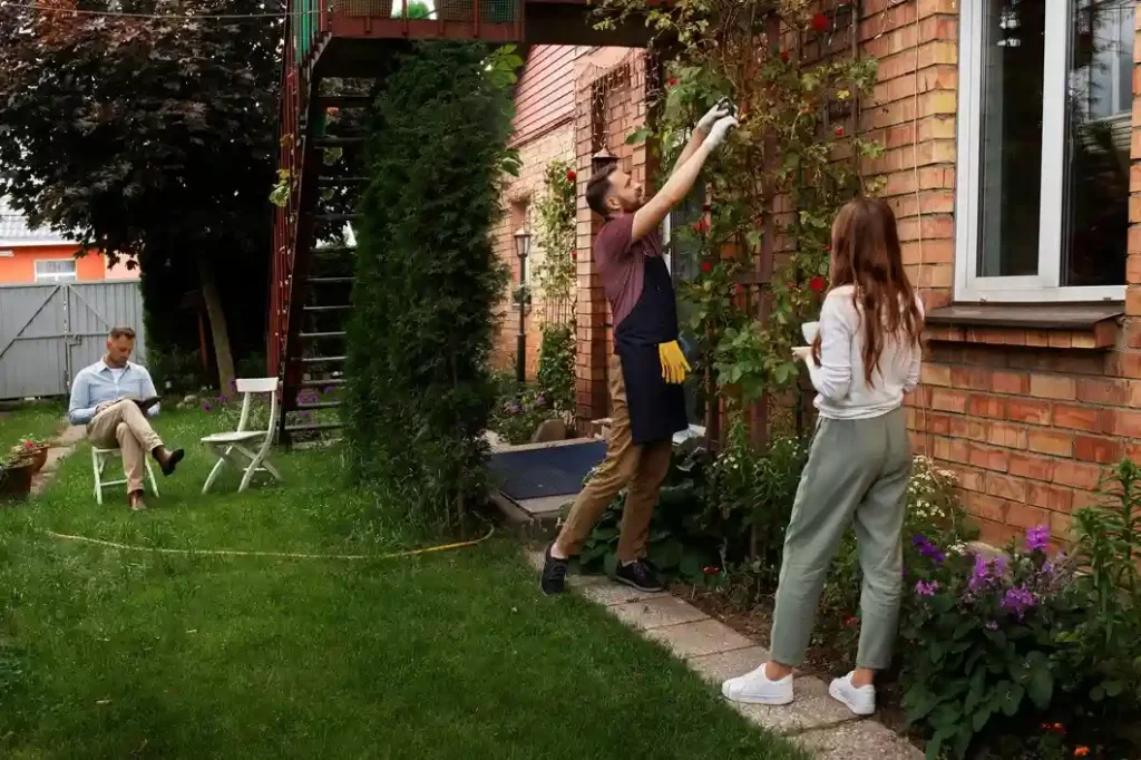 Family enjoying outdoor space upgrade with cozy seating and greenery.