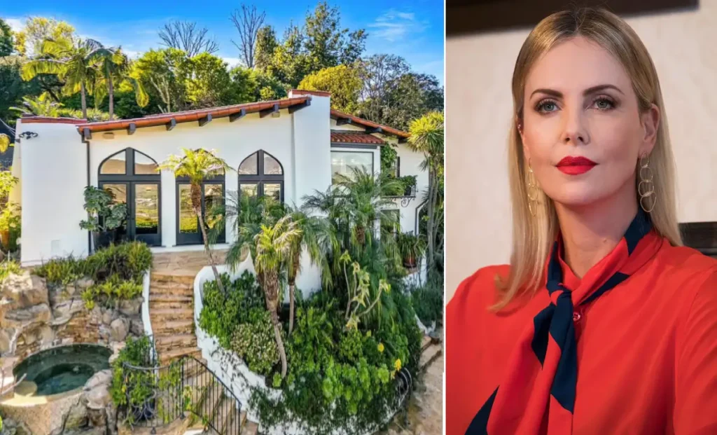 Charlize Theron house exterior showing modern farmhouse style architecture with white wood siding and manicured landscaping